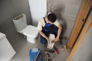 Toilet Flange Leaks in Philadelphia Rowhomes shown in a realistic Philadelphia, PA residential construction setting.